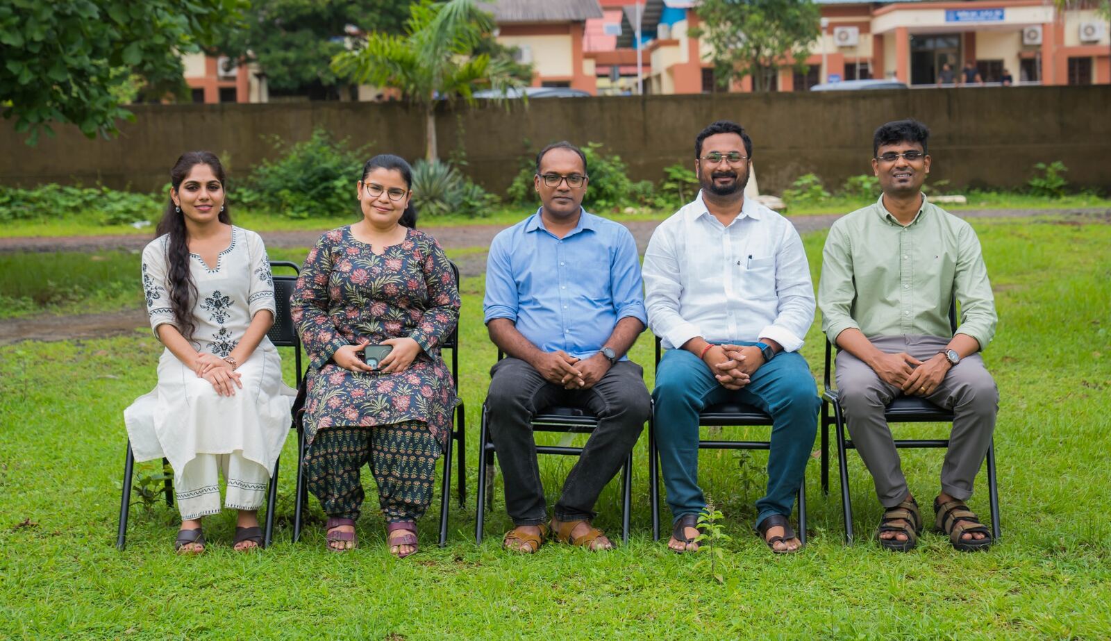 Five SHSS faculty members seated outdoors on the IIT Goa campus